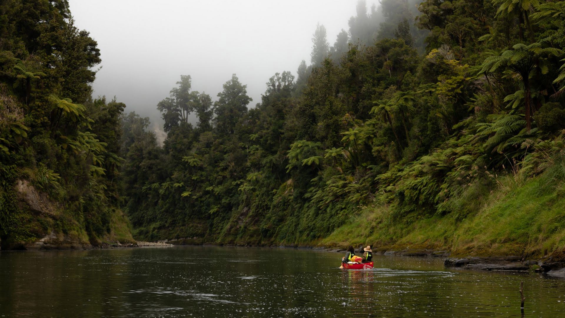 Couple paddling down the Whanganui River.jpg