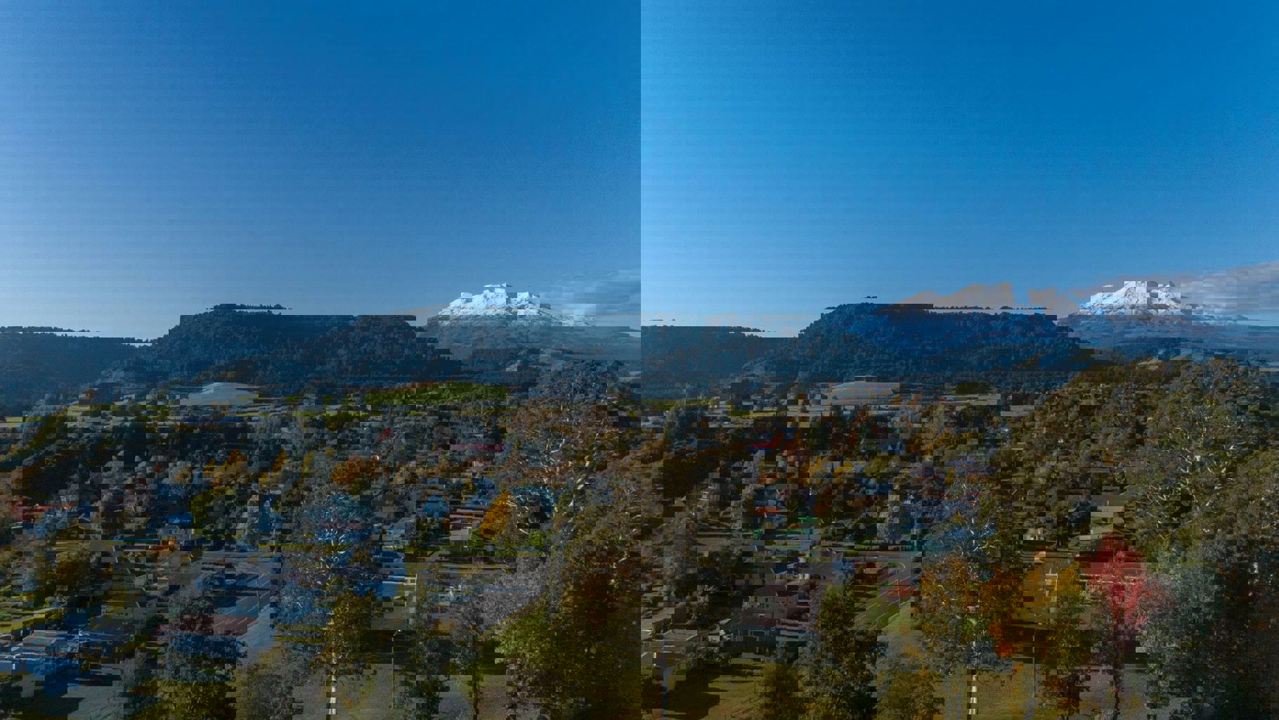 Drone shot Ohakune snowcapped Mt Ruapehu - Visit Ruapehu