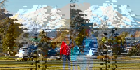 Family walking dog in Ohakune with Mt Ruapehu in the background - Visit Ruapehu.jpg