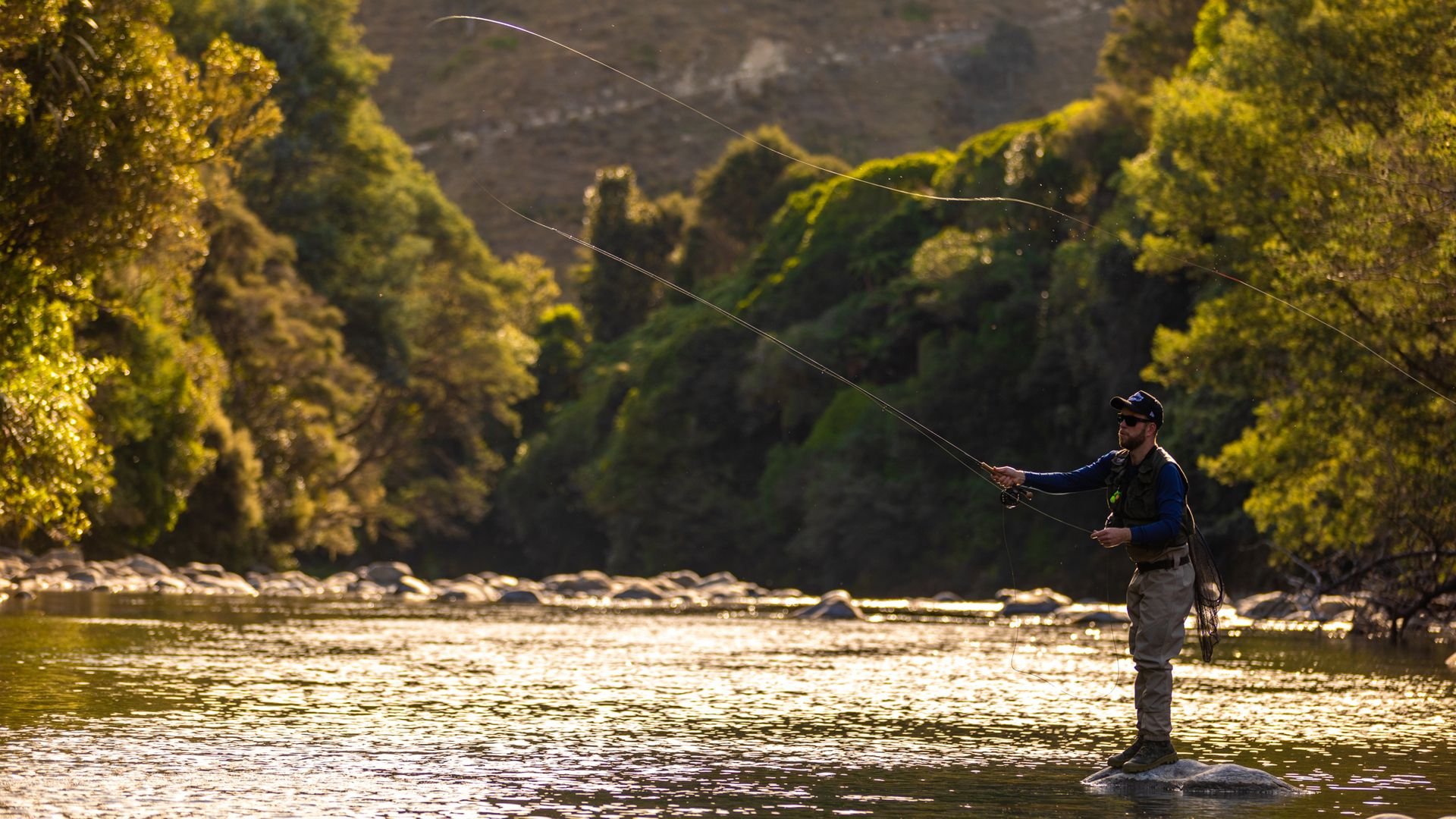 Man fly fishing in river at Ruatiti - Visit Ruapehu.jpg