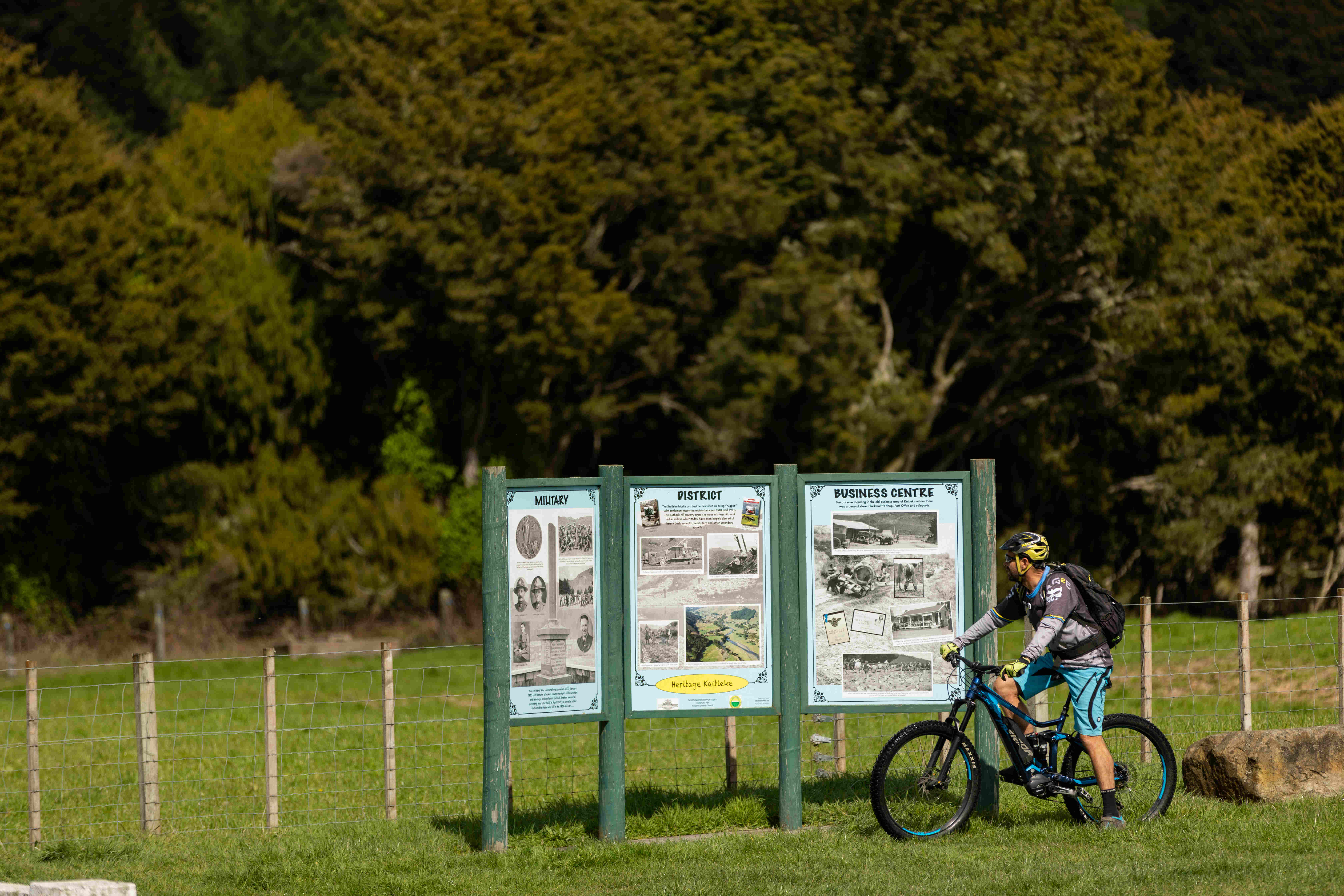 Man reading a sign on Fishers Track - Visit Ruapehu.jpg