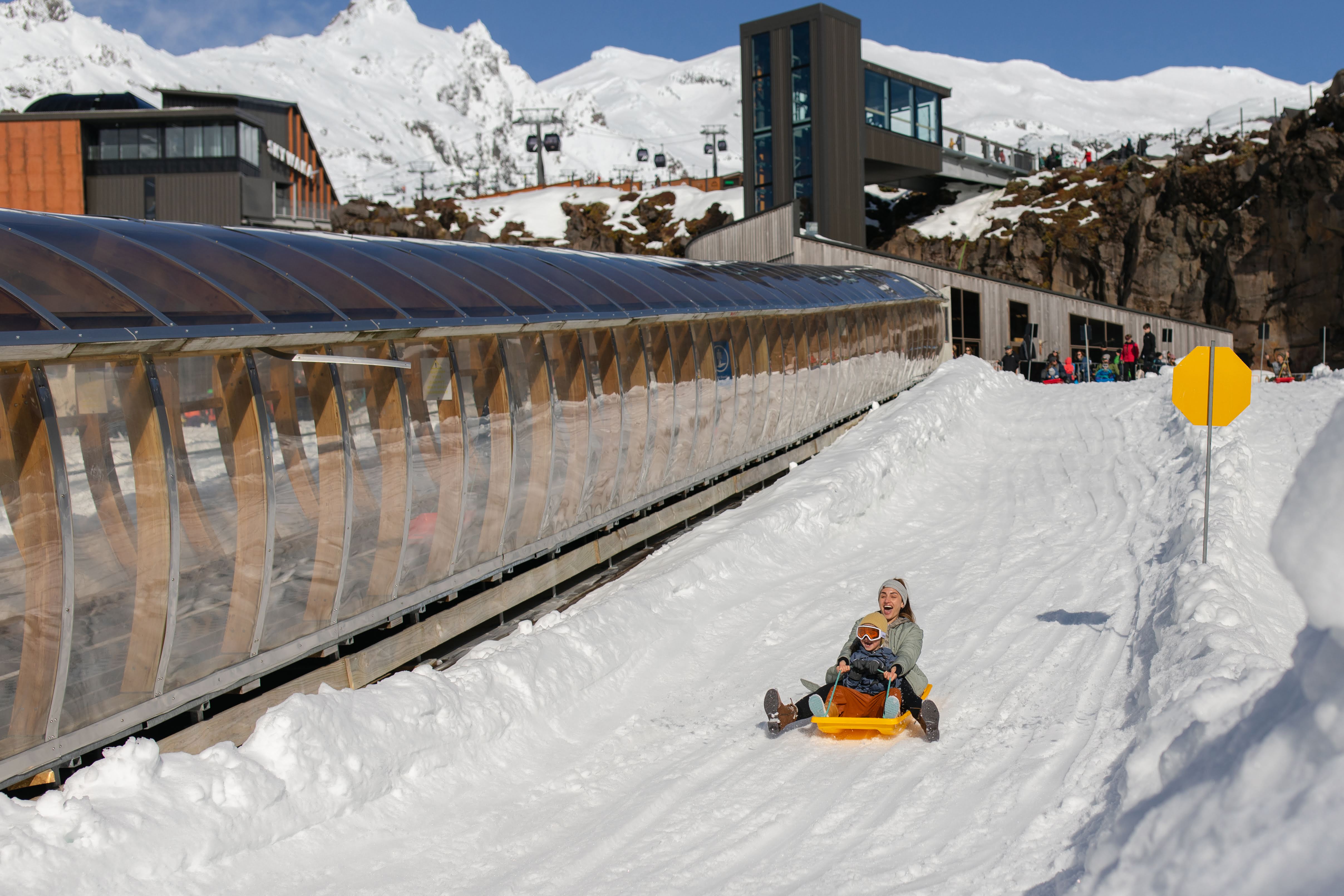 Mother and Son Sledding at Happy Valley - Visit Ruapehu.jpg