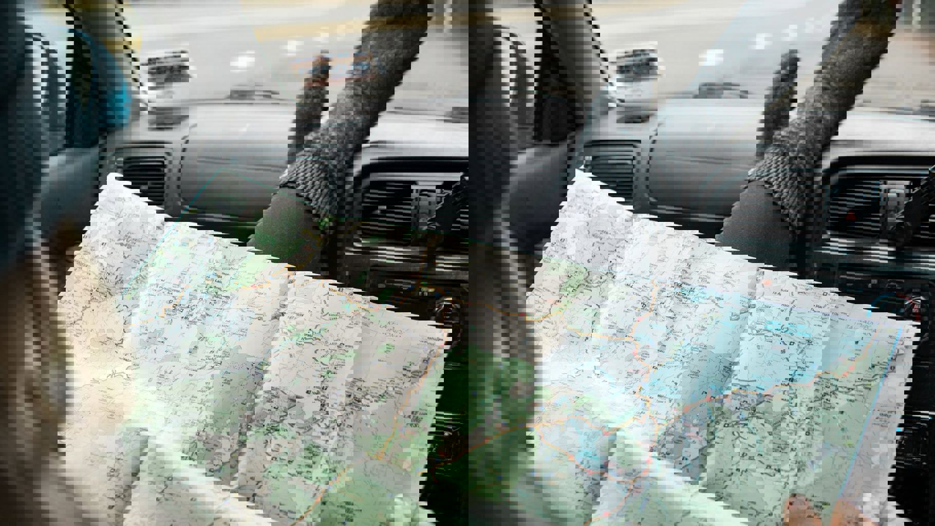 Passenger looking at map of Ruapehu - Visit Ruapehu