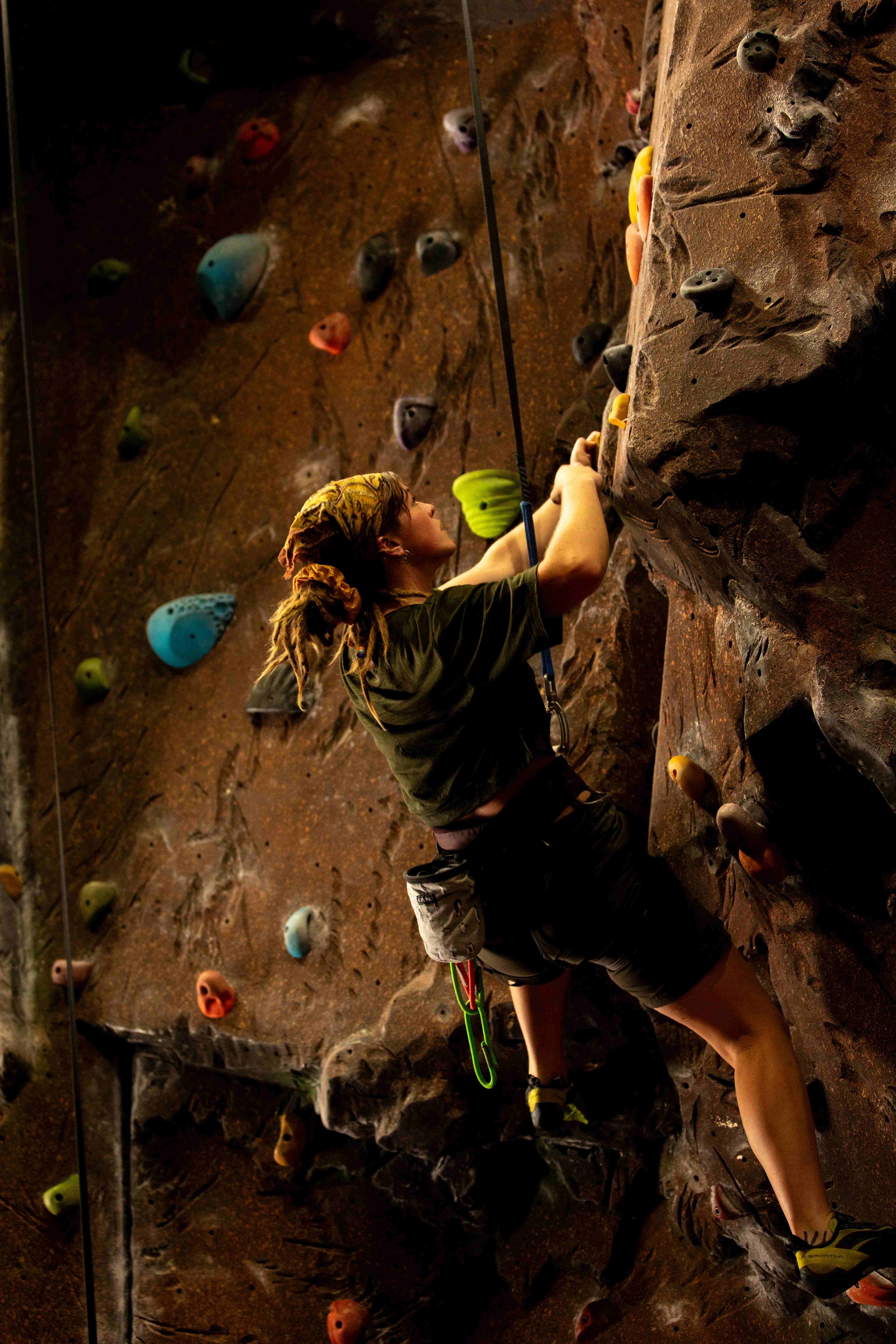 Woman Climbing the Climbing Wall at Vertigo Climbing.jpg